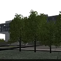 Modern School Buildings Surrounded By Greenery With Lake And Sports Field On Campus