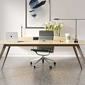 Modern Office Desk Setup With Laptop Table Lamp Flower Vase And Coffee Mug