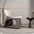 Modern White Leisure Chair With Dark Legs Side Table Vase Black Floor Lamp Light Wall