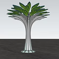 Tree Shaped Outdoor Light with Silver Trunks Green Leaf Like Top Under Blue Sky
