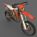Orange and Black Motocross Motorcycle With Large Off Road Tires And White Seat