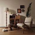 Cozy Accent Chair In Living Room With Wooden Bookshelf Floor Lamp And Potted Plant