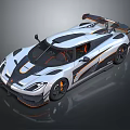 White High Performance Sports Car With Streamlined Body Black Accents And Rear Spoiler