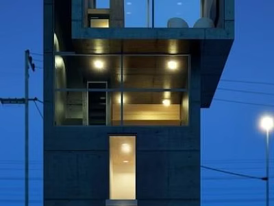 Modern Concrete Building Exterior With Glass Windows And Illuminated Balconies At Night 3d model