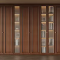 Modern Wooden Cabinet With Glass Doors Displaying Books And Decorative Vases