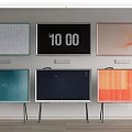 Multiple Televisions In Different Colors With Diverse Screen Displays Wall Mounted And On Stands