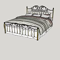 White and Gold Metal Frame Double Bed with Ornate Headboard Striped Quilt and Pillows