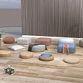 Cozy Floor Cushions And Poufs With Wooden Wall And Plants On Wooden Floor