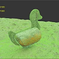 Wooden Building Blocks Duck Shaped Rocker With Orange Seat Placed On Sand Surface