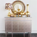 Elegant Wall Decor With Golden Mirror Lamp Vases Candle Holders And Silver Cabinet