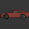 Red High Performance Sports Car With Large Rear Spoiler And Black Wheels