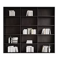 Modern Dark Wood Bookcase With Multiple Compartments Stacked Books And Decorative Items