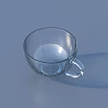 Refreshing Beverage in Clear Glass With Lemon Slice Mint Leaf on Yellow Saucer and Spoon