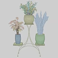 Stylish Garden Decor With Gold Metal Plant Stand And Textured Planters Holding Green Plants