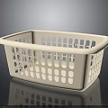 Beige Plastic Square Laundry Basket With Perforated Holes And Reflective Surface On Gray Background