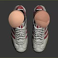 Stylish White Athletic Sneakers With Red Stripes And Brown Soles On Prosthetic Legs