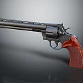 Classic Revolver With Textured Red Grip And Shiny Metal Barrel Design