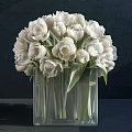 Beautiful White Tulips Arrangement In Transparent Glass Vase With Green Leaves