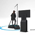Person Wearing VR Headset On Platform With Display Screen And Surrounding Equipment
