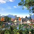 Scenic Water Fountain in Resort Area with Mountain Backdrop Lotus Leaves Reflections and Traditional Buildings