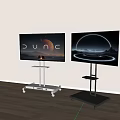 Modern Televisions on Wheeled Metal Stands with Dune and Futuristic Screen Visuals