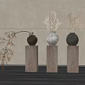 Ceramic Vases On Wooden Pedestals With Decorative Pampas Grass And Beige Wall