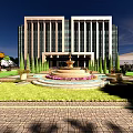 Modern Office Building Exterior With Landscaped Garden And Surrounding Trees