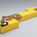 Yellow Modular Public Chair With Spiral Patterns For Urban Seating Spaces