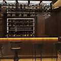 Elegant Bar Interior With Wine Racks Dining Table Chairs And Pendant Lights