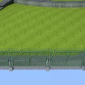 Steel Communication Tower Standing On Green Grass With Surrounding Wall And Pathways
