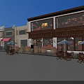 Charming Commercial Street With Red Brick Buildings Red Awnings Outdoor Seating And Wooden Deck