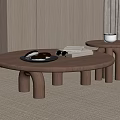 Two Round Modern Wooden Coffee Tables with Pastries Book and Cup in Living Room