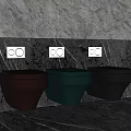 Three Colorful Wall Mounted Toilets With Built In Control Panels On Textured Grey Wall