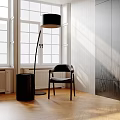 Inflatable Black Chair In Modern Living Room With Floor Lamp And Wooden Floor