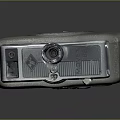 Vintage Electronic Camera With Classic Retro Design And Shiny Metal Body