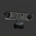 Vintage Silver And Black Electronic Camera With Lens And Knobs