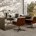 Modern Workspace Wooden Desk With Two Leather Chairs And Brick Wall Natural Light