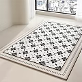 Square Carpet With Black And White Floral Pattern Border In Bright Room With City View
