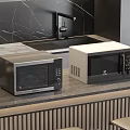 Two Microwave Ovens On Modern Kitchen Countertop With Marble Backsplash And Black Faucet