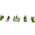 Colorful Lego Boat Models Five Different Designs With Green Bases And Yellow Parts