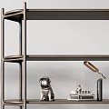 Two Modern Bookcases With Multitiered Shelves Holding Books Decorative Items Plants And Table Lamp