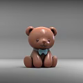 Cute Brown Bear Sculpture With Blue Bowtie Sitting Artistic Decorative Design