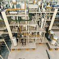Modern Industrial Plant Facility With Metal Frames Pipes And Storage Tanks
