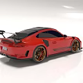 Red Black Sports Car With Aerodynamic Rear Spoiler And Gold Alloy Wheels