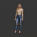 Woman In Beige Cropped Top And Blue Ripped Jeans Standing With Gray Background Reflective Floor