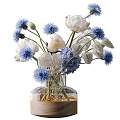 Transparent Vase With White Peonies And Blue Thistles On Wooden Base With Fairy Lights
