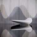 White Boat Shaped Sculpture With Reflection On Water Surface And Wavy Wooden Wall Background