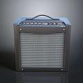Portable Black Electric Guitar Amplifier With Control Knobs And Speaker Grille