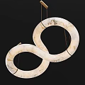 Ivory Marble Chandelier With Interlocking Ring Design Suspended By Black Cords And Golden Mounts