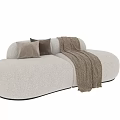Soft Beige Fabric Two Seater Sofa With Plush Pillows And Knitted Blanket